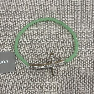 Petite Soft Green Multi Faceted Beads Crystals on Silver Tone Cross Bracelet